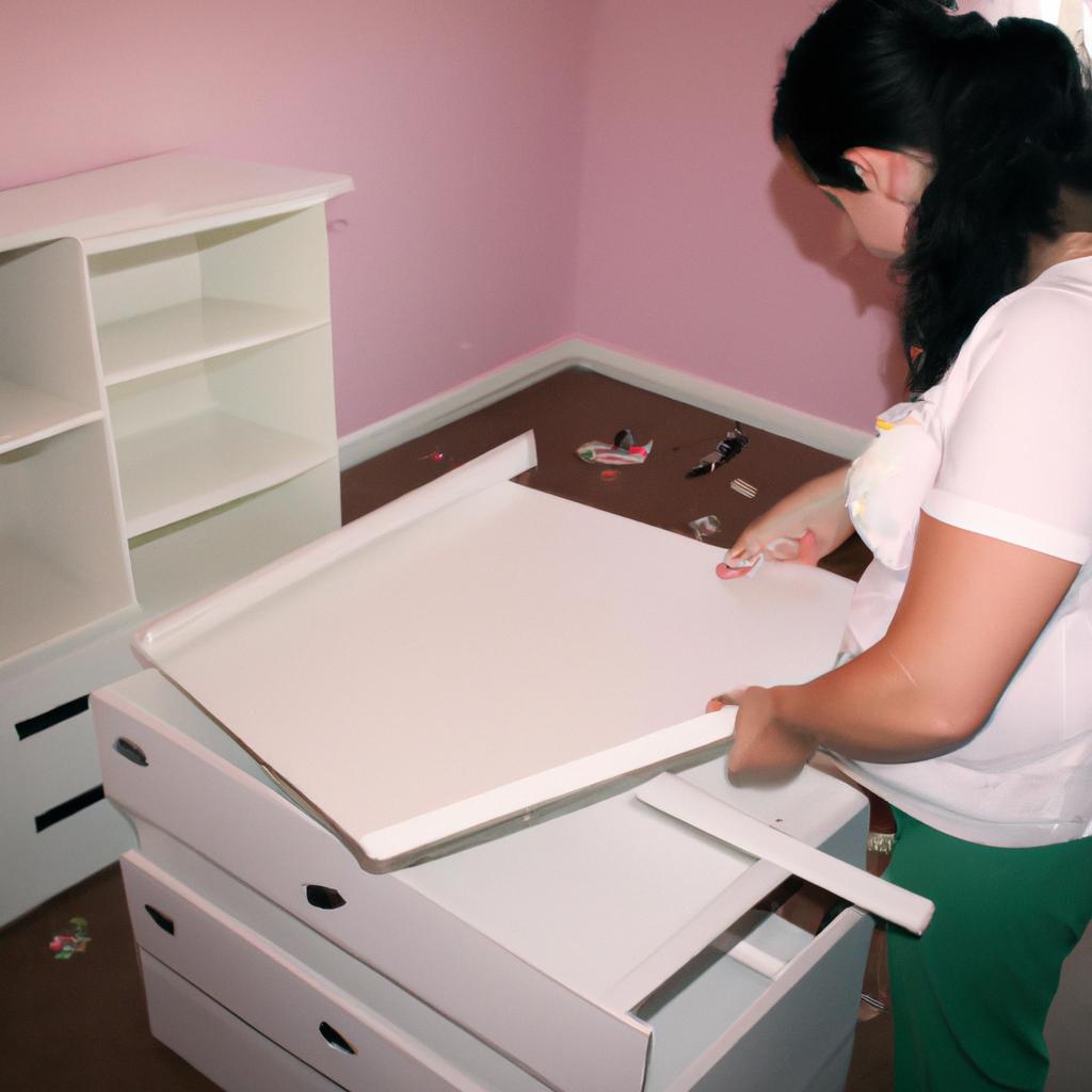 Person assembling nursery changing table