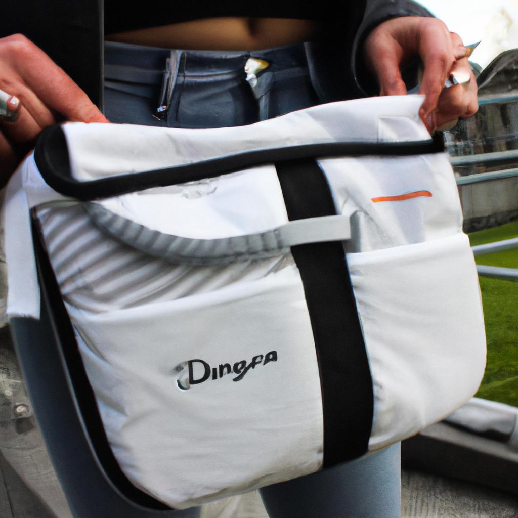 Person holding a diaper bag