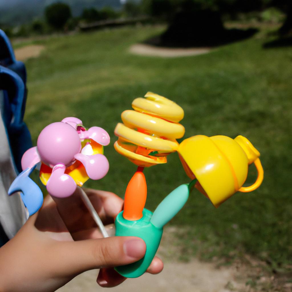 Person holding outdoor baby toys