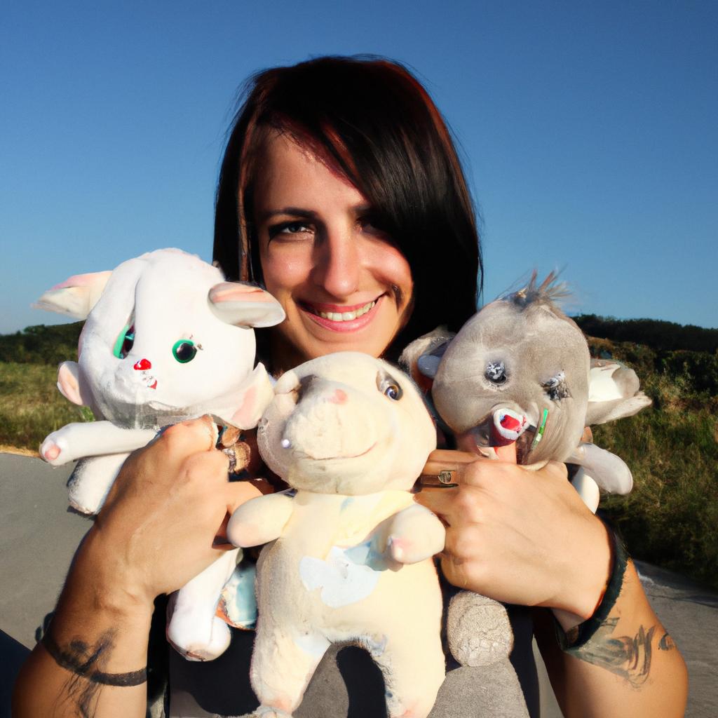 Person holding stuffed animals, smiling