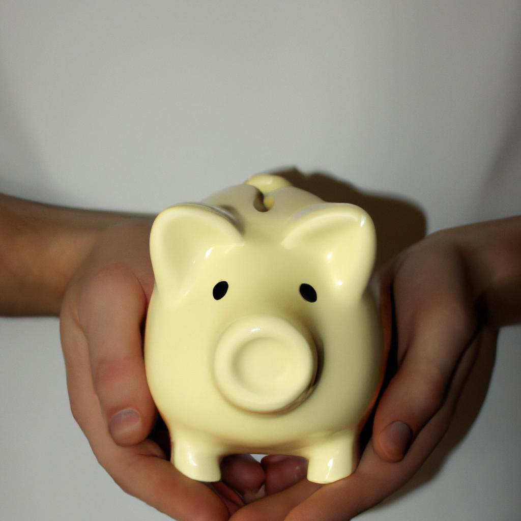 Person holding piggy bank